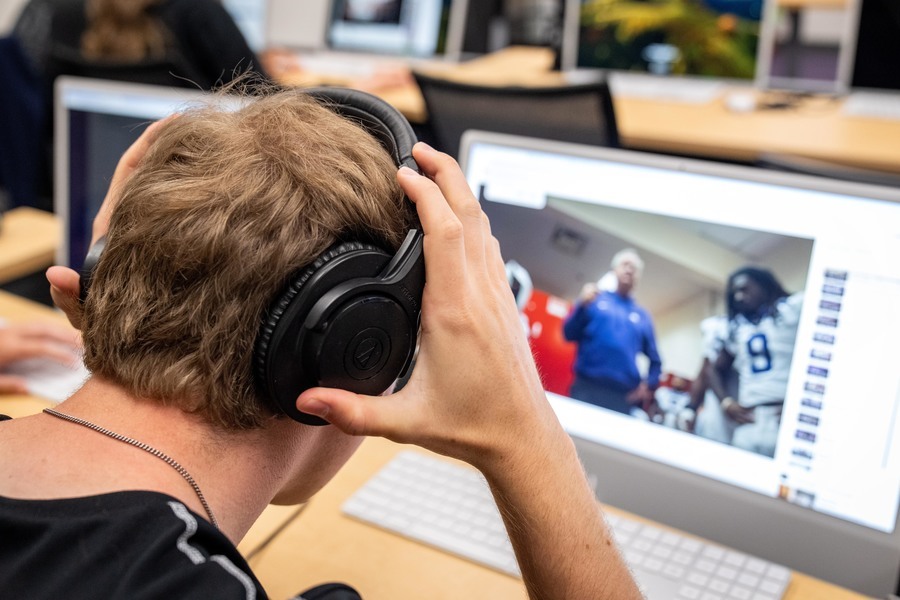 A TCU student works with digital media in an FTDM lab.