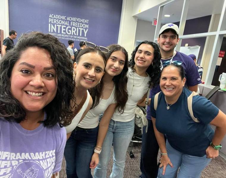 Admission counselor Jessica pictured with international students and their families