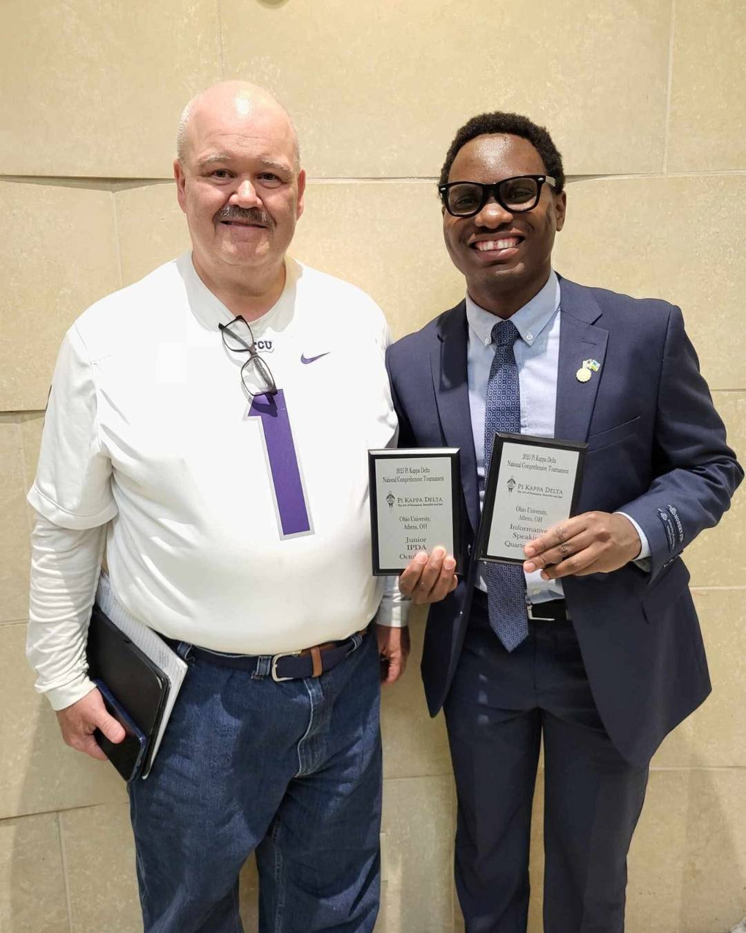 Happy Herman pictured with his coach, Professor Dan Moss