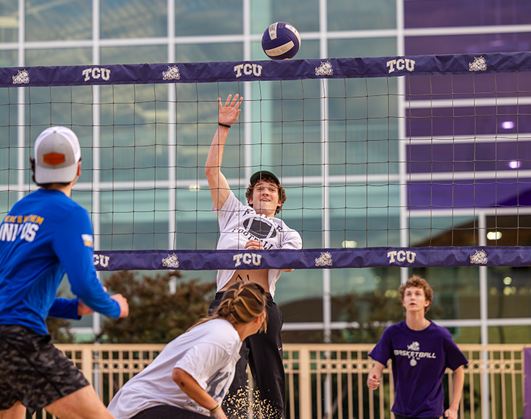 TCU students playing volleyball at Campus Recreation Center