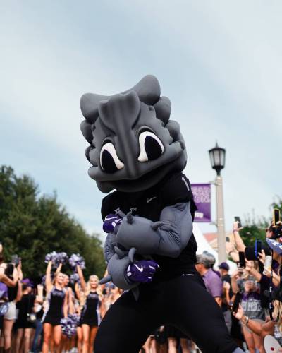 Super Frog at Frog Walk before a football game.
