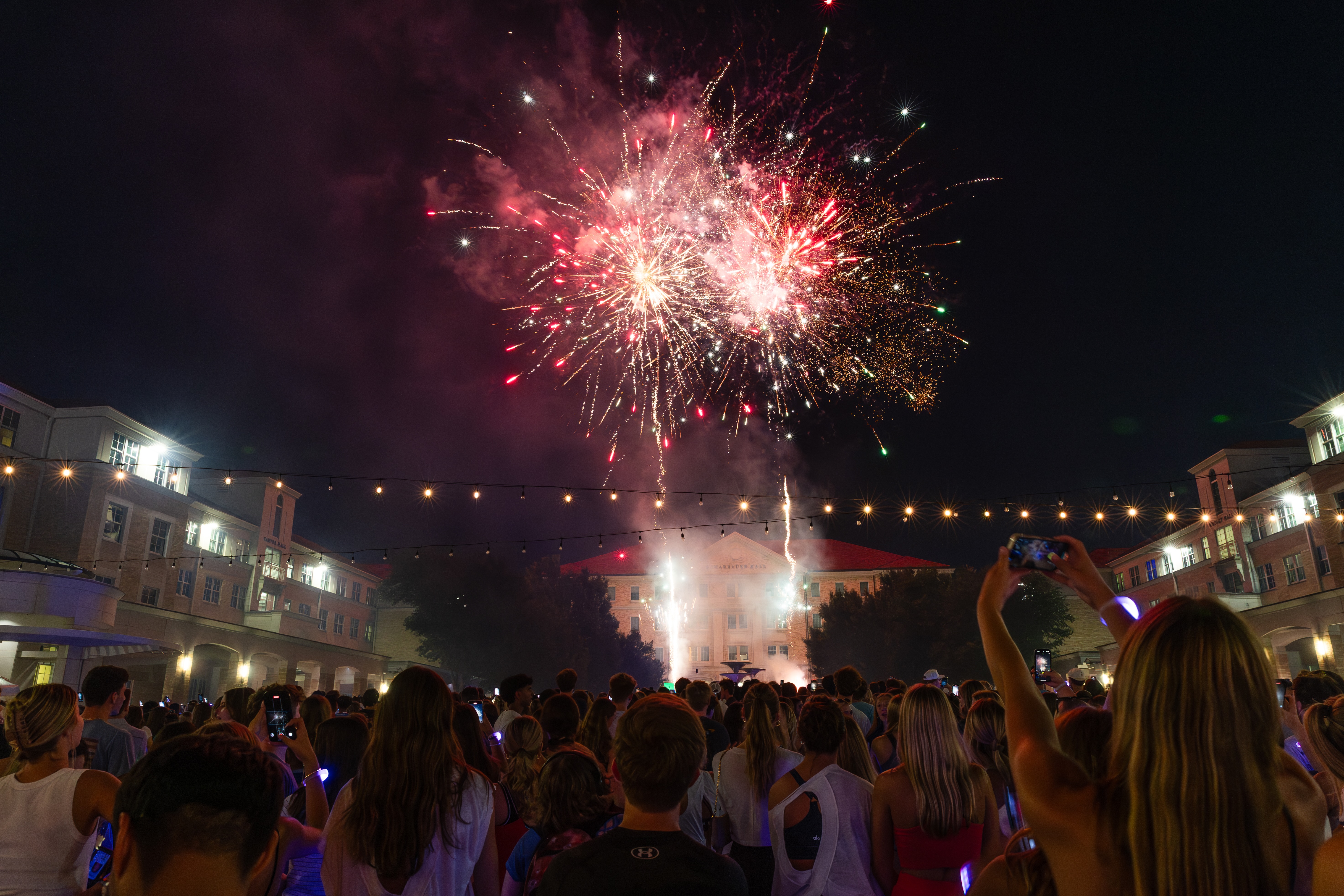 After the Chancellor's Welcome, first-year students in the class of 2029 gather in the Campus Commons for fireworks, music and dancing, August 16, 2025. Photo by Amy Peterson.