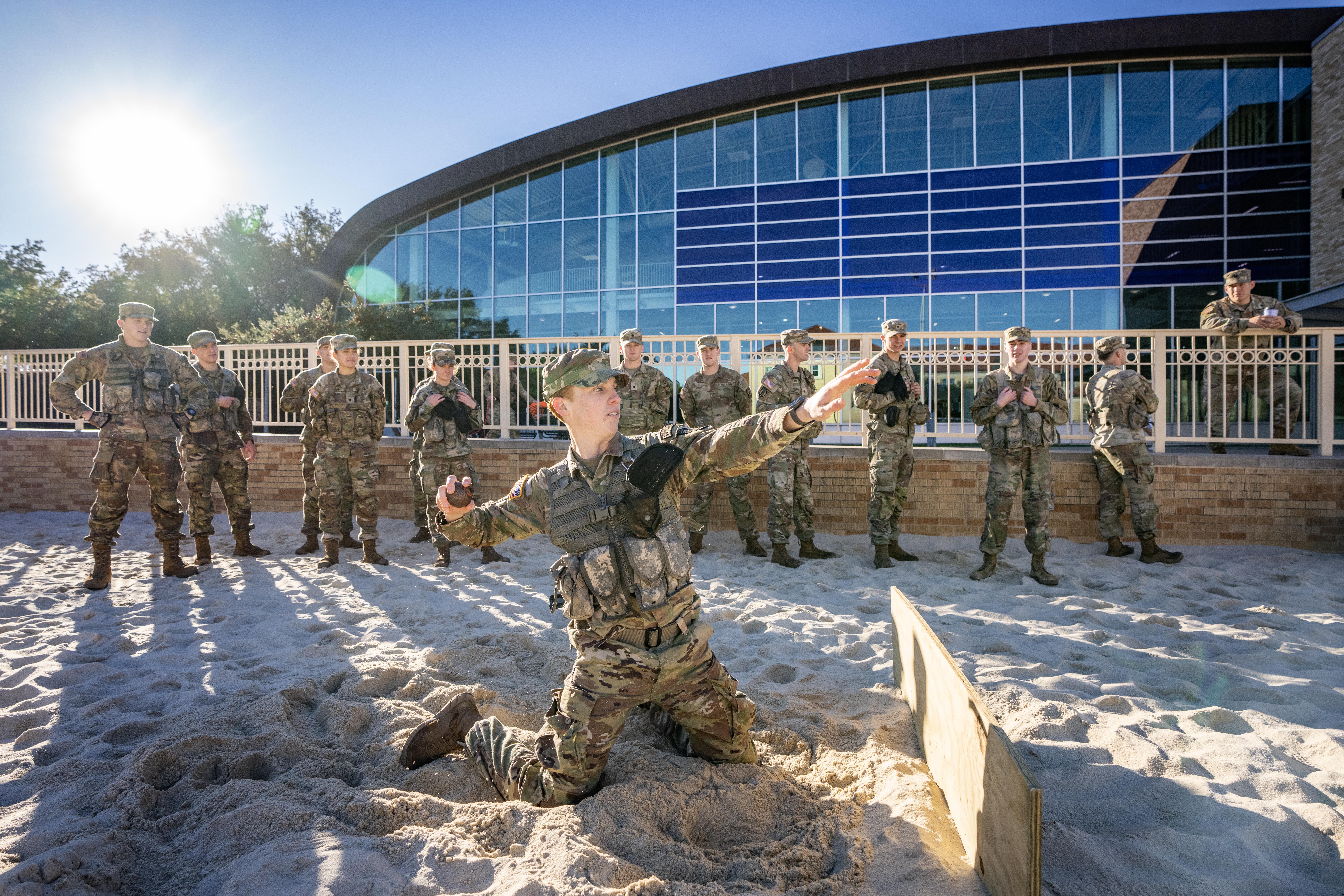 Cadets in TCU's Army ROTC program meet for Leadership Lab (MILS 10001) in the sand volleyball courts at the Recreation and Wellness Center, November 20, 2024. Photo by Jeffrey McWhorter.