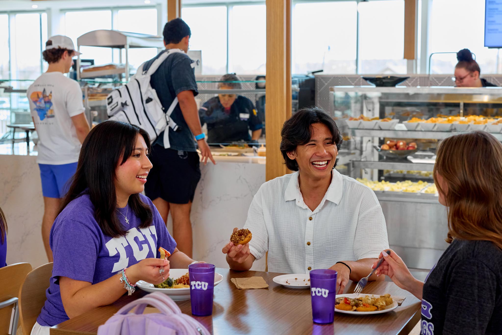 Students eat and socialize in the newly-opened Gutierrez Hall dining facility, March 25, 2025. Photo by Shelbie Whitten.