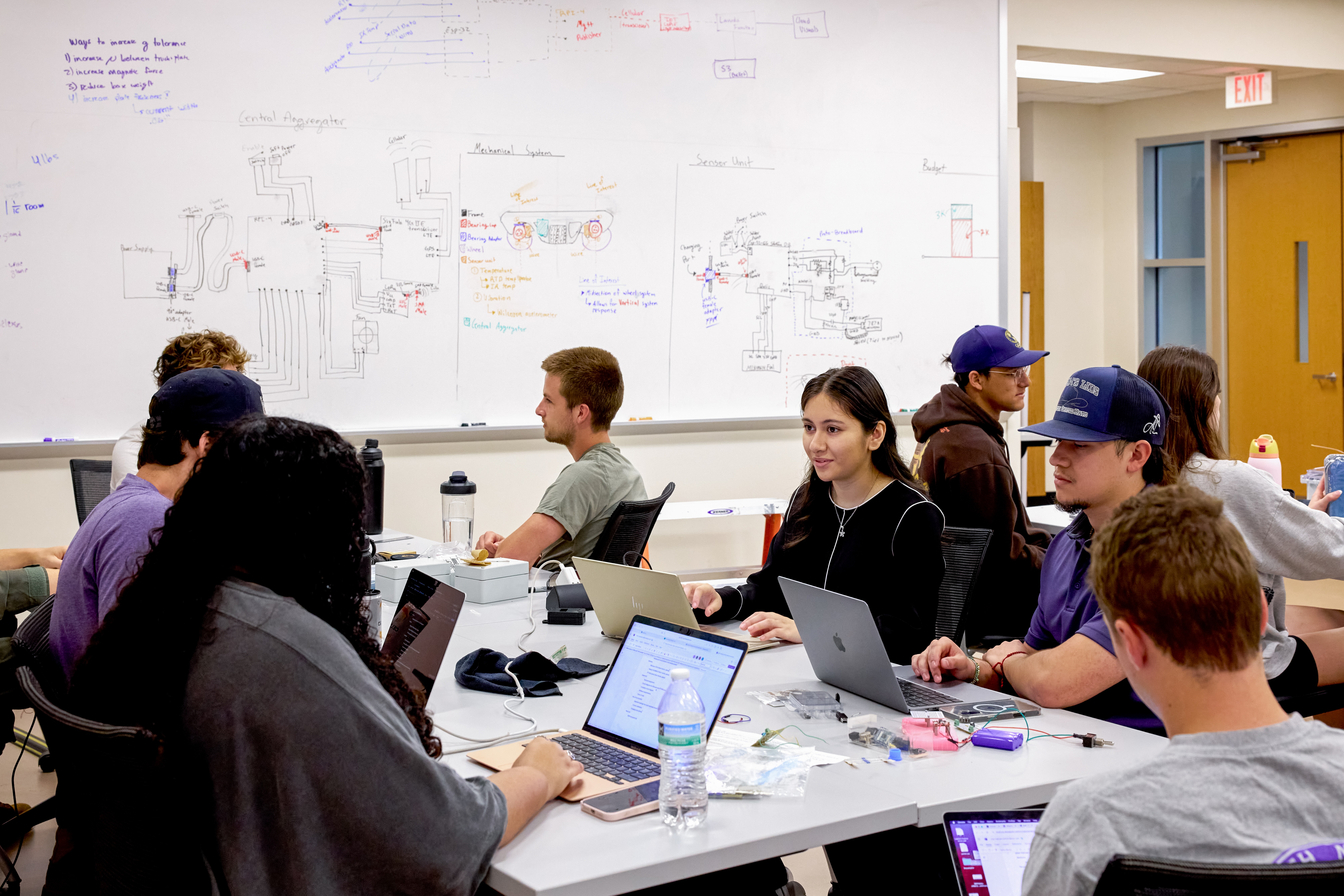 Engineering students work in a lab