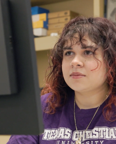Campos working at her computer