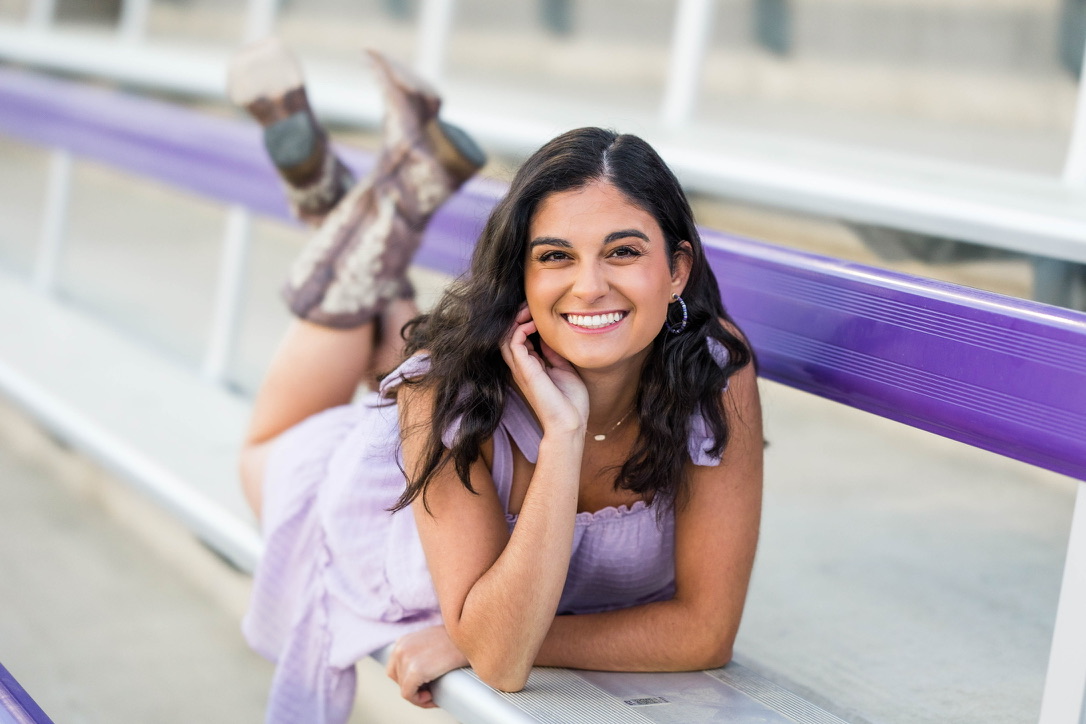 Julia Morales in the stadium for her grad photos