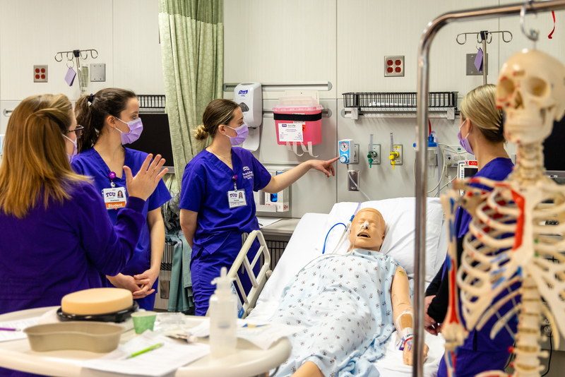 TCU Nursing Students working on mock patient2 