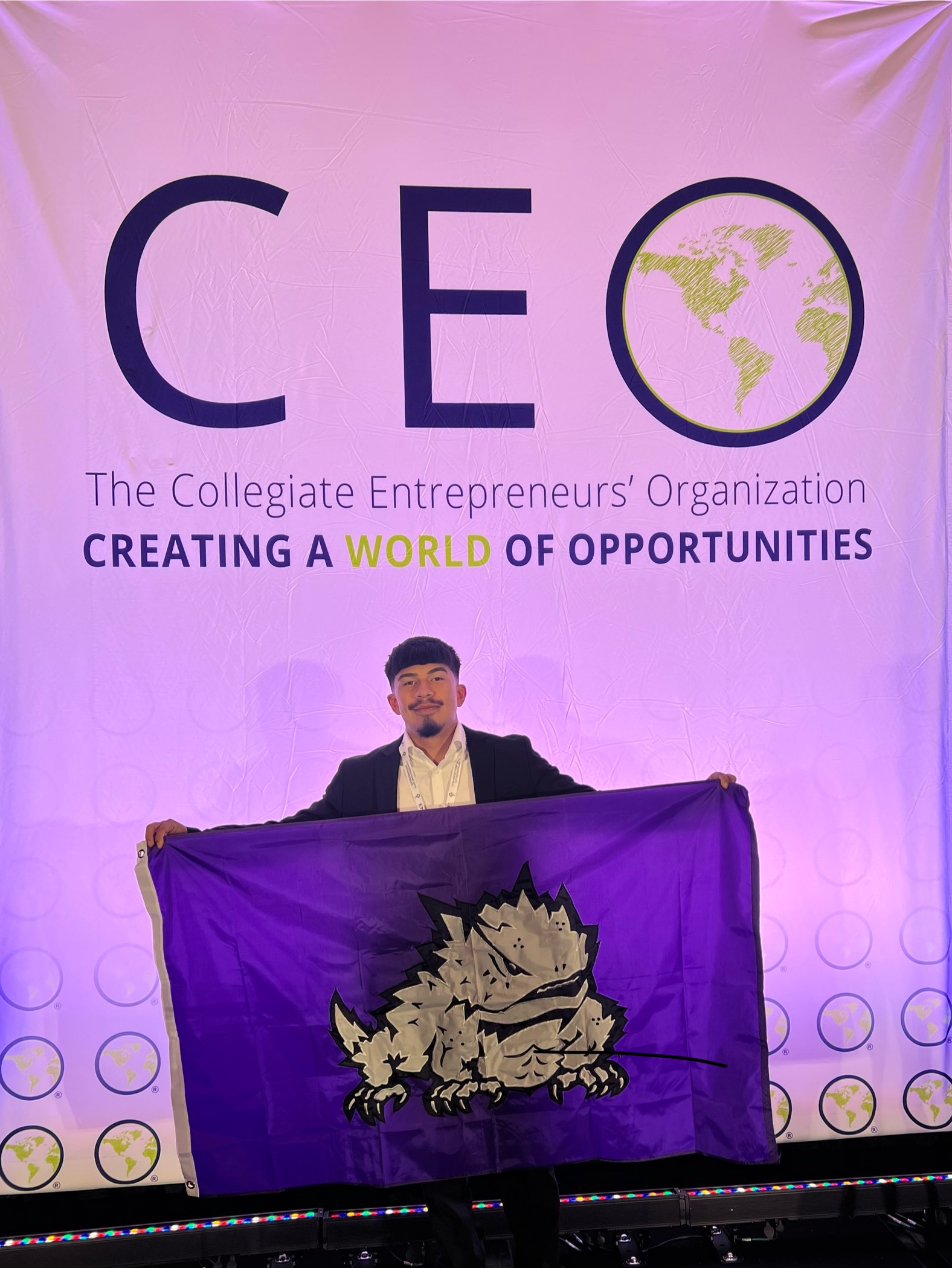 Pina at a Collegiate Entrepreneur's Organization event.