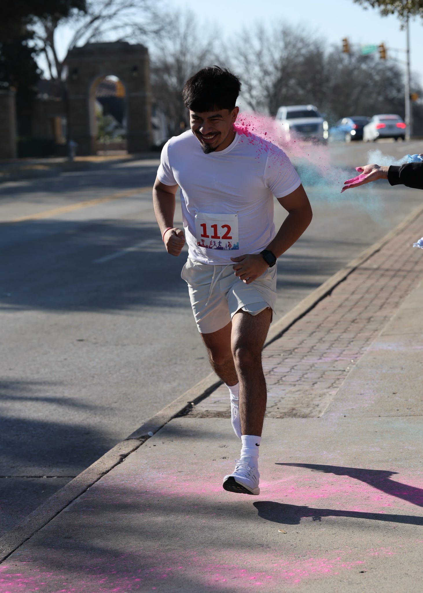 Pina running a color run.