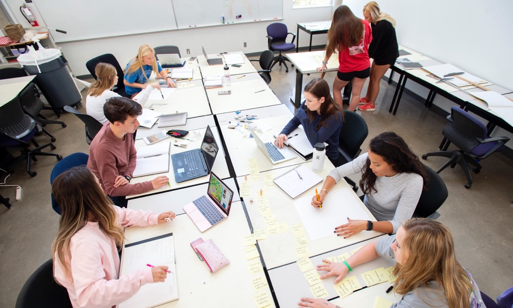Students in class working on a group project