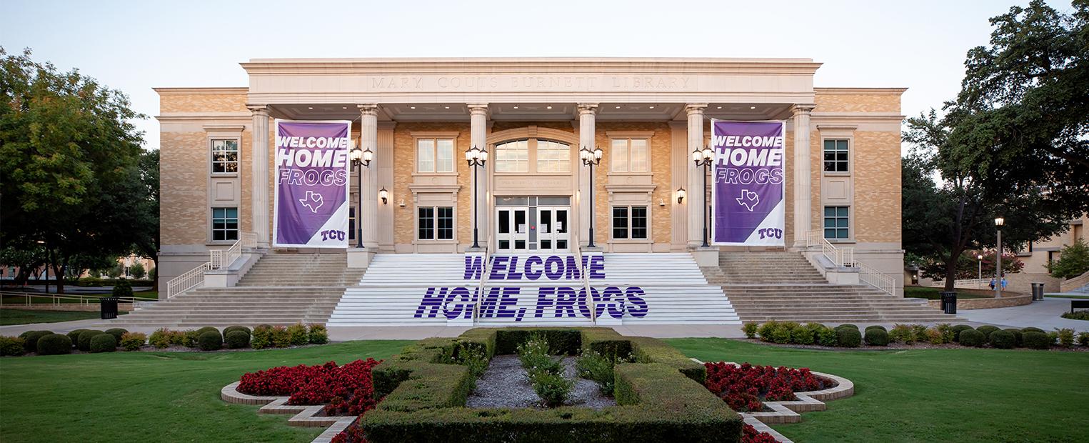 Front steps of library with "Welcome Home" signs 