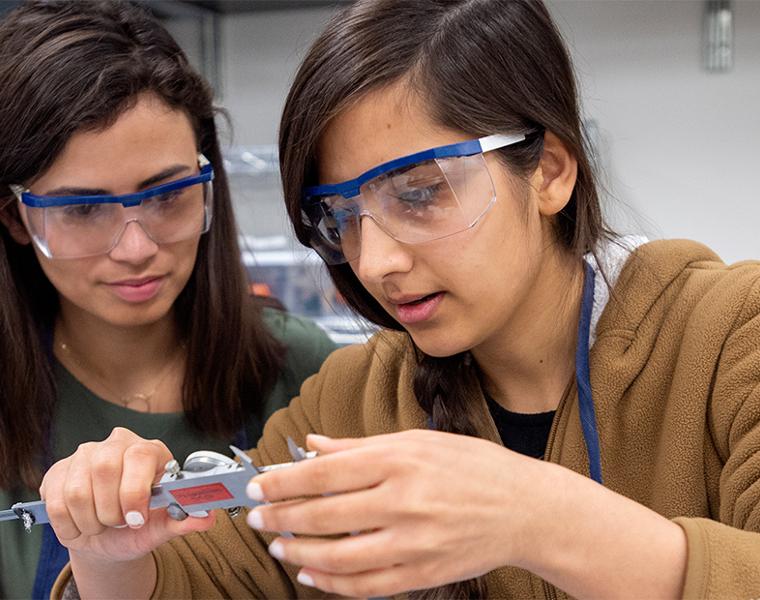 female engineering students working in a lab 