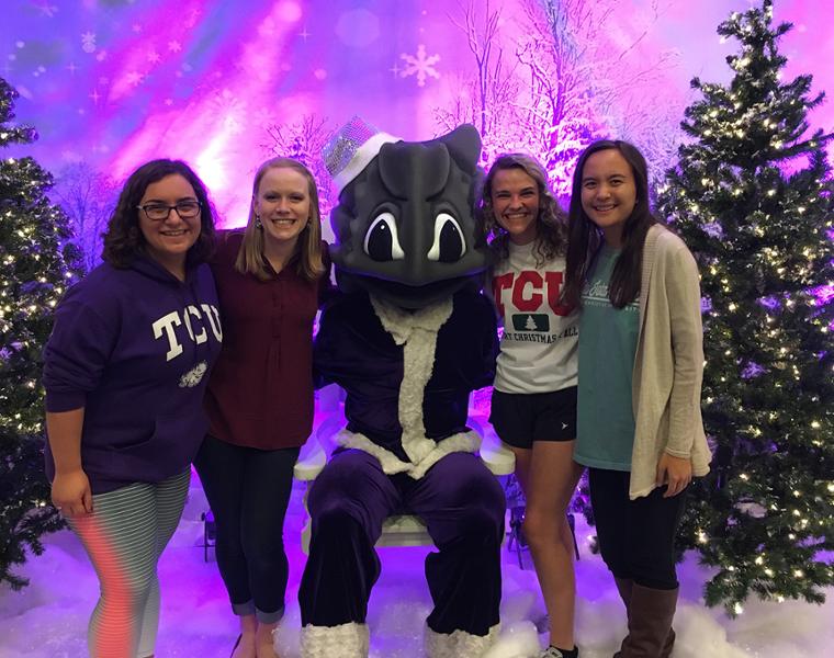 TCU students with SuperFrog santa at the tree lighting