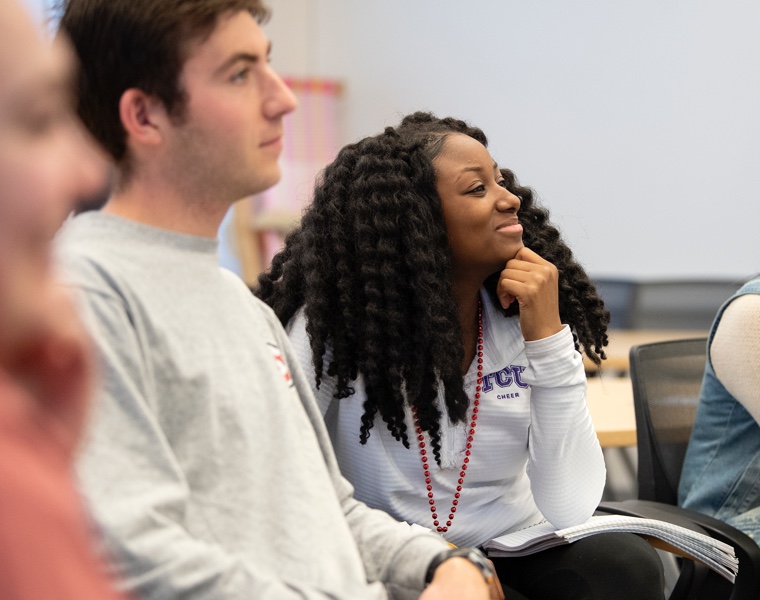 TCU students listen in class