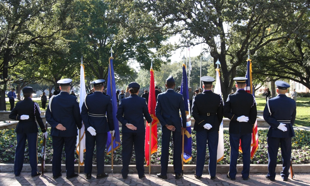 men and women in uniform standing together
